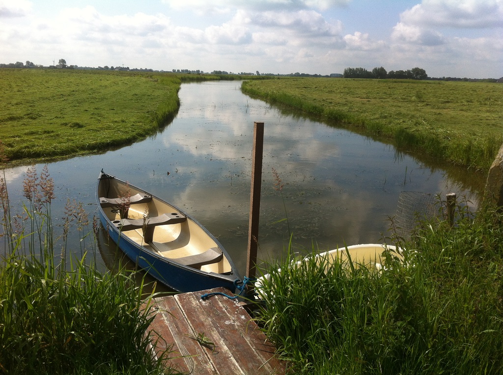 jetty with canoes