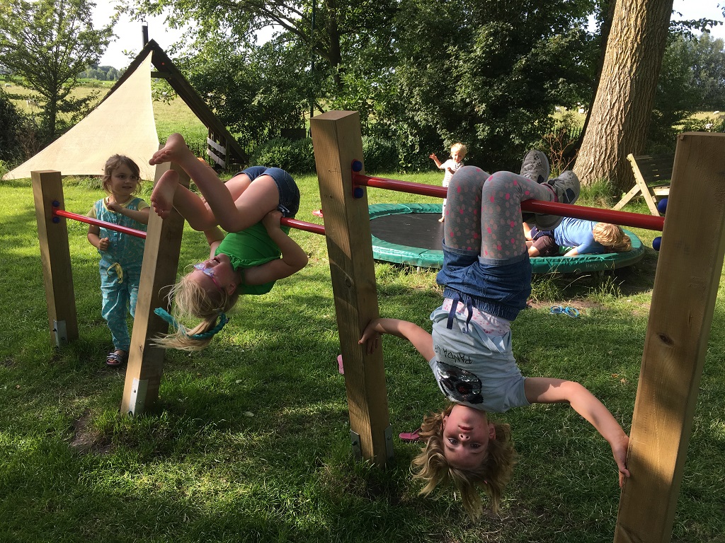 hanging on the horizontal bar